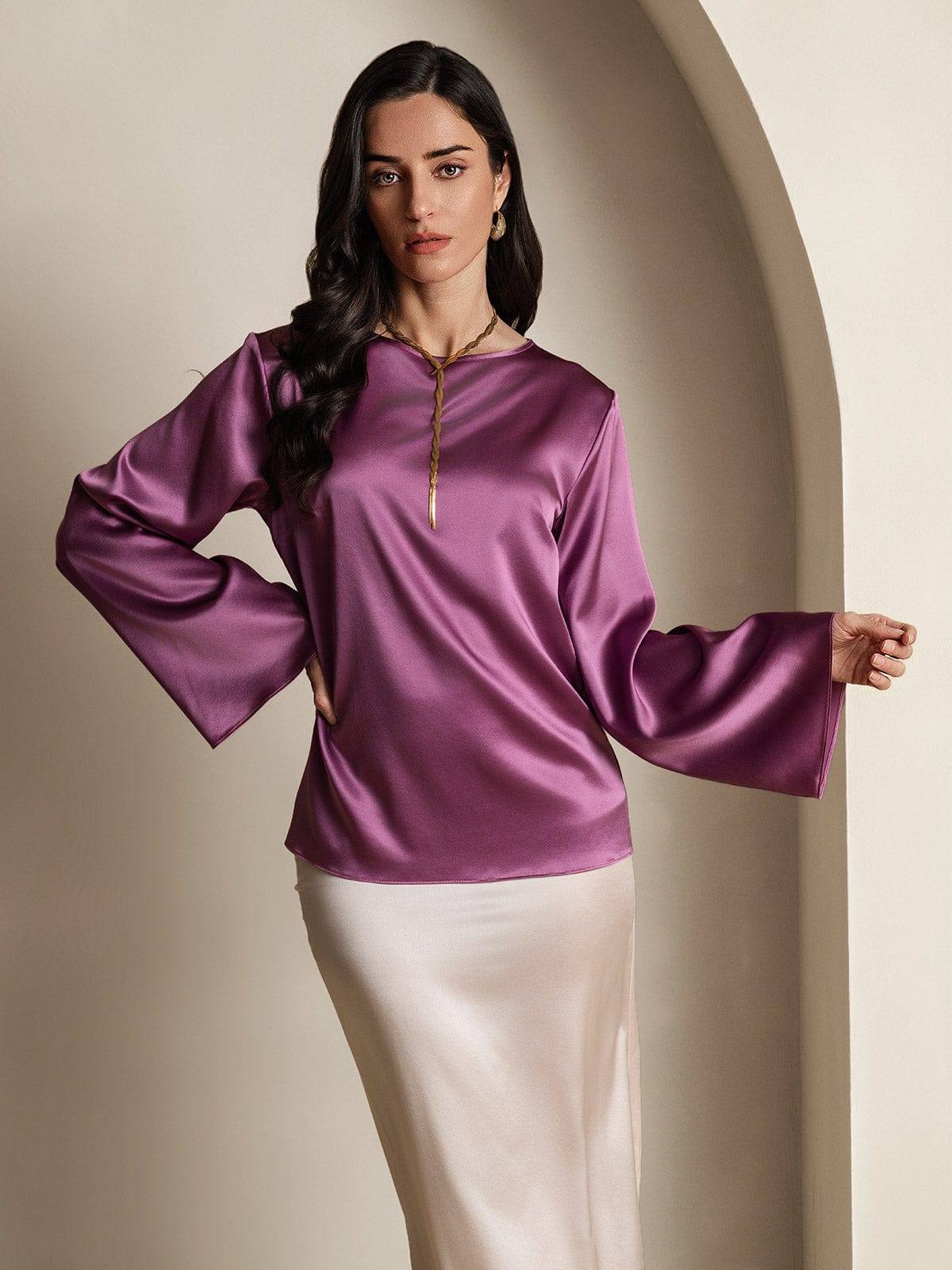 Purple satin blouse with dramatic bell sleeves and gold cord trim neckline