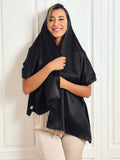 Black satin scarf/shawl worn as a hooded drape over shoulders