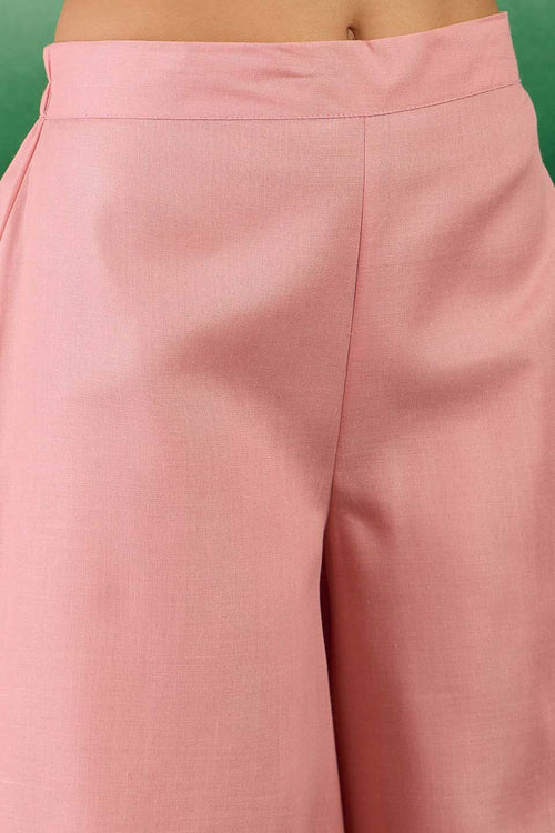 Coral linen wide-leg pants with elastic waistband and front seam details