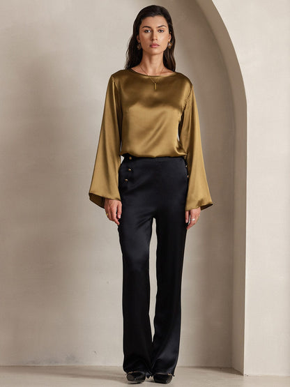Olive satin blouse with flared sleeves and round neckline, shown full length