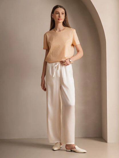 Silk relaxed elastic-waist pants in white, wide-leg with drawstring tie at waist