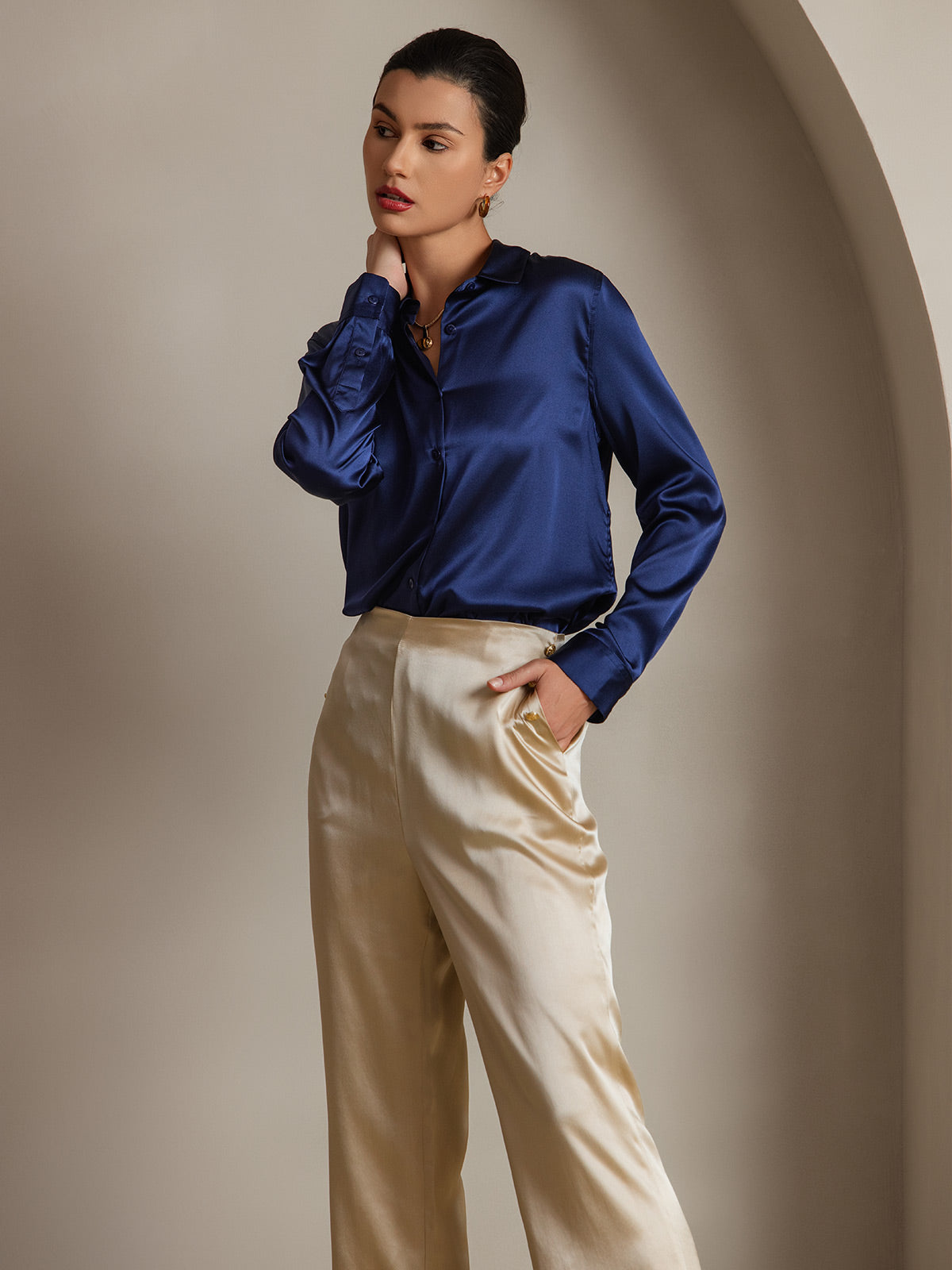 Midnight blue satin button-down shirt with point collar and visible button placket