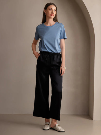 Black wide-leg elastic-waist pants, gathered waist, ankle length, relaxed fit