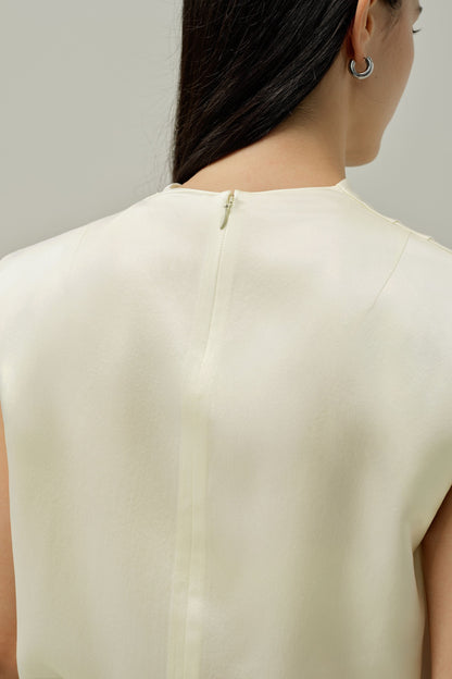 Ivory satin sleeveless blouse back detail with center seam and yoke