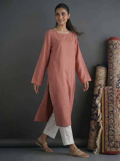 Dusty rose long kurta with side-slit hem and white straight pants, solid set