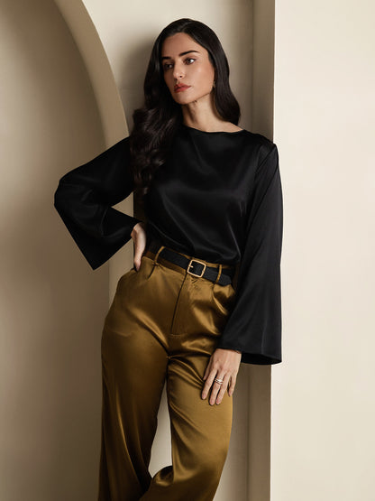 Black satin flare sleeve blouse with round neckline and wide cuffed sleeves.