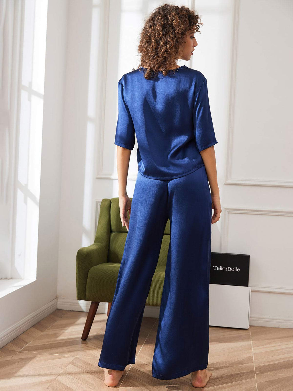 Navy satin pajama set for women, back view: short-sleeve top and wide-leg pants