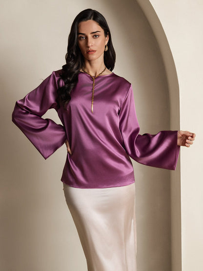 Purple satin blouse with dramatic bell sleeves and gold cord trim neckline