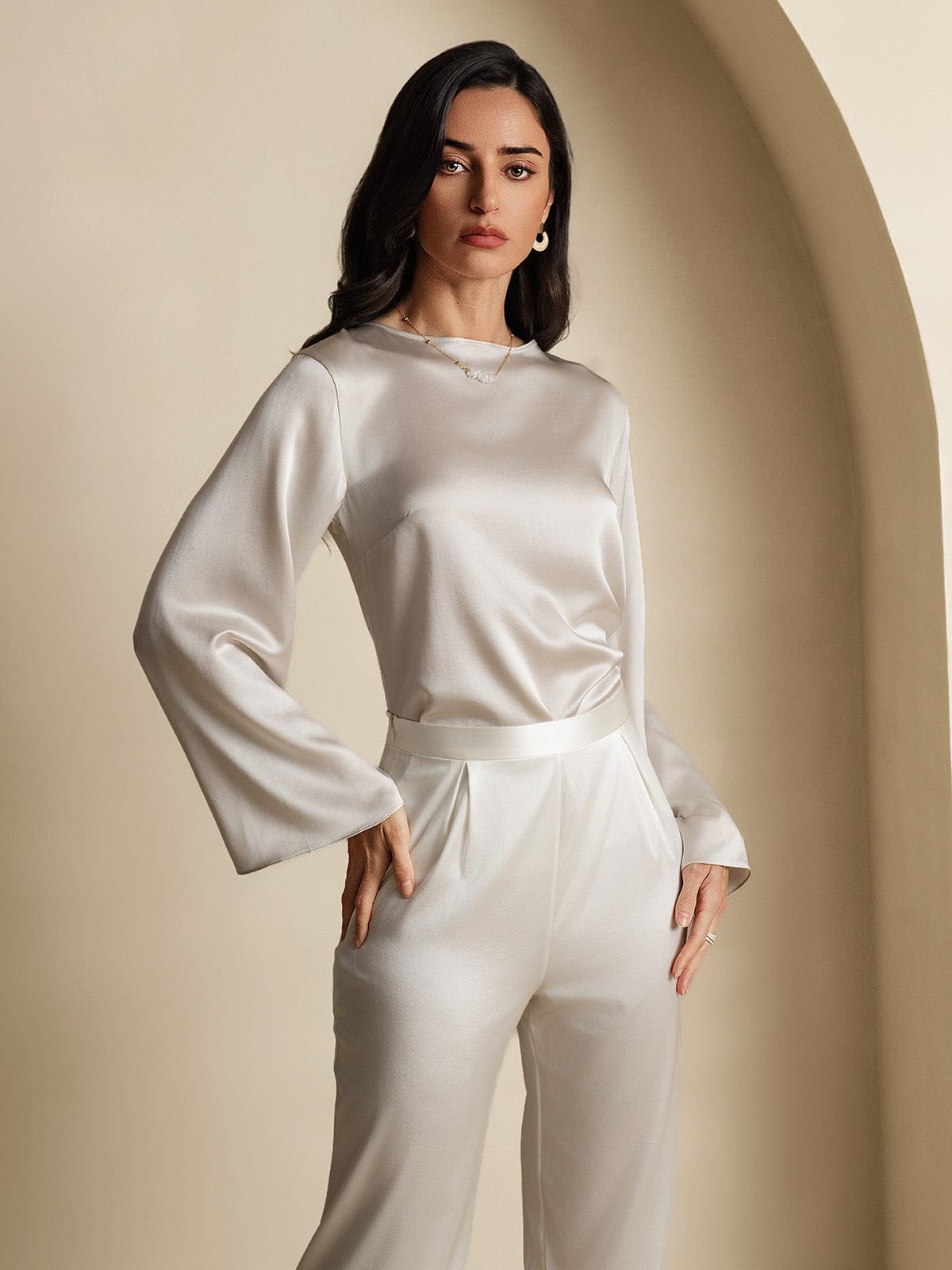 Satin long-sleeve blouse with high neckline and relaxed balloon sleeves, front view