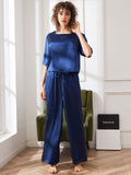 Navy satin pajama set for women: short-sleeve top and wide-leg trousers