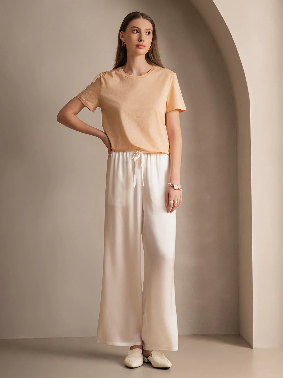 Silk relaxed elastic-waist pants in white, draped wide legs and ribbon-tied waist