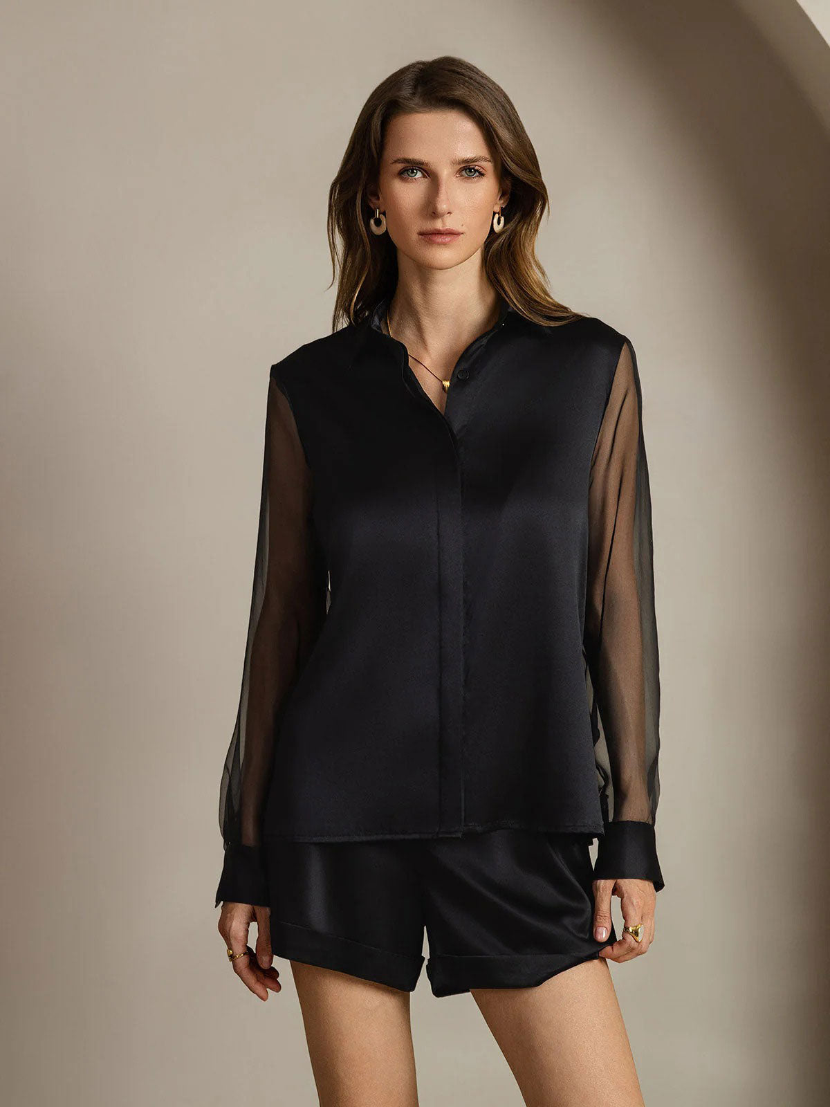 Black silk blouse with sheer organza sleeves, button-front and stand collar