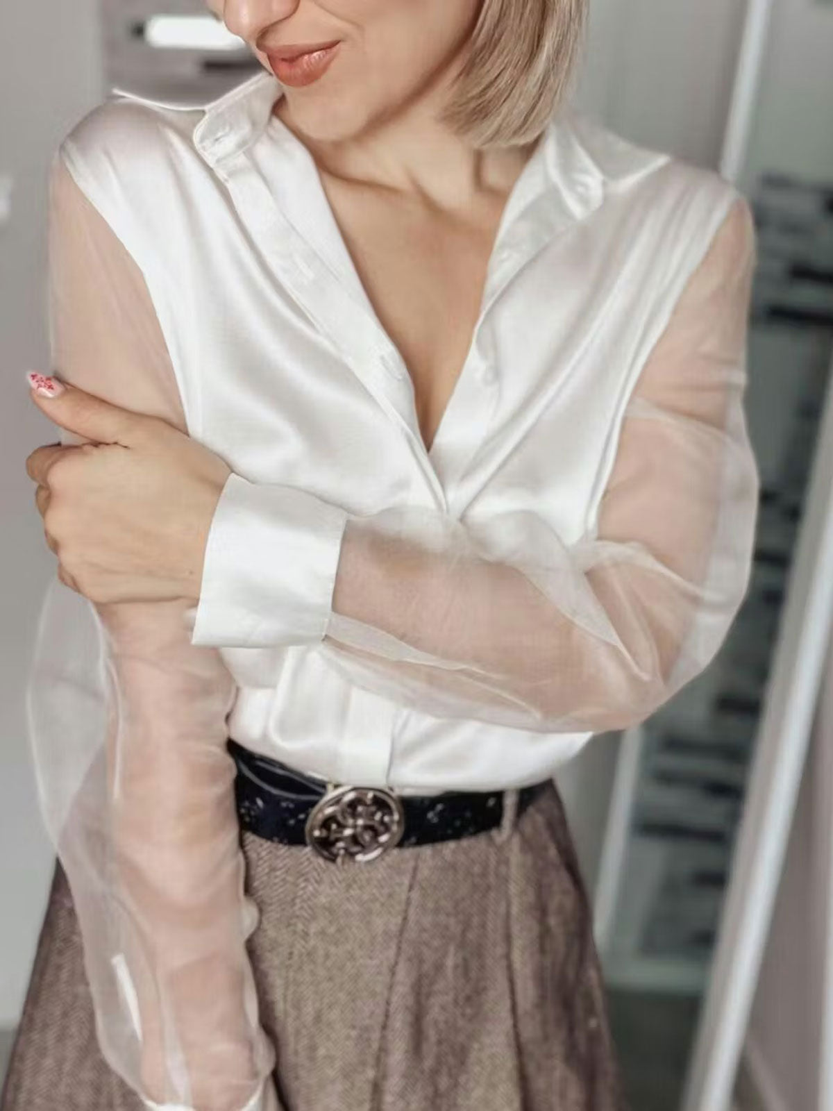 White silk blouse with sheer organza sleeves, V-neck opening and button front
