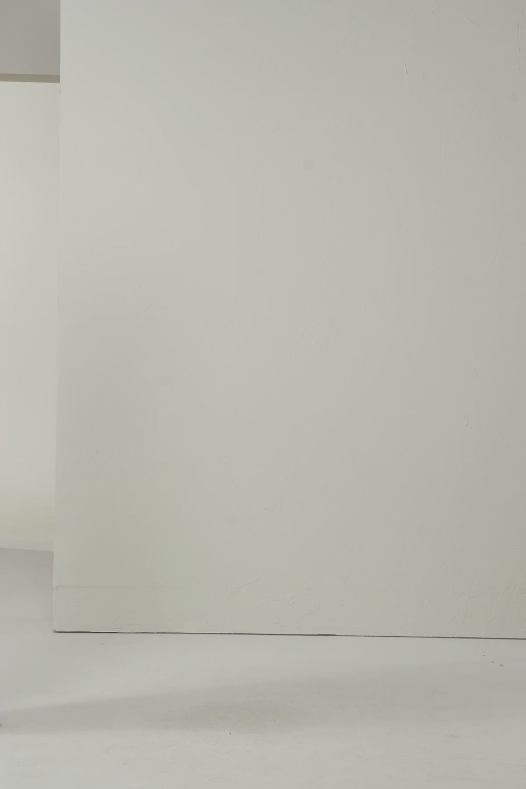 Elegant Ivory Satin Draped Sleeveless Blouse